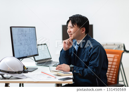 Construction management desk work 131450569