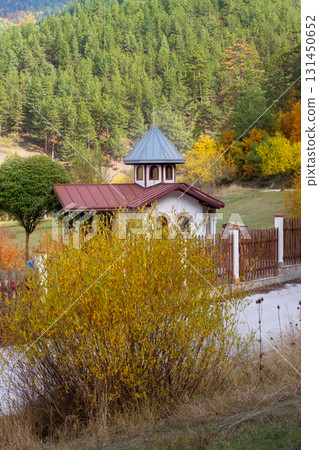 Autumn landscape with chapel and house, Bulgaria 131450652