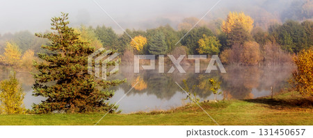 Autumn foggy forest and lake, banner 131450657