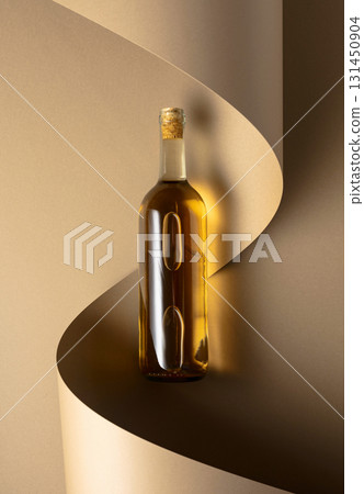 Bottle of white wine on a beige background. 131450904