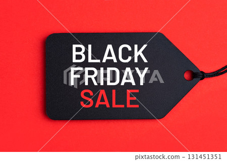 Black Friday tag on red background 131451351