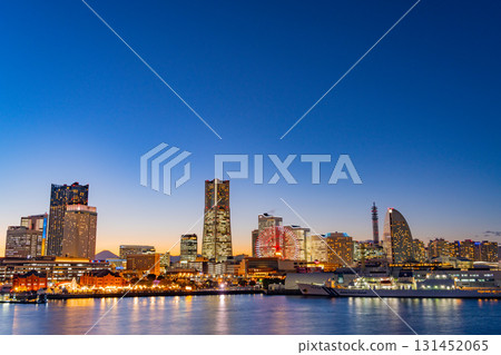 [Kanagawa Prefecture] Yokohama Minato Mirai Light-up Illumination - Distant view of Mt. Fuji between the buildings - Twilight 131452065