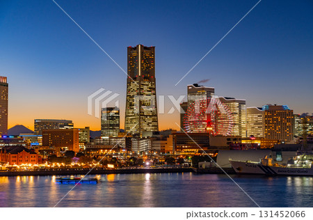 [Kanagawa Prefecture] Yokohama Minato Mirai Light-up Illumination - Distant view of Mt. Fuji between the buildings - Twilight 131452066