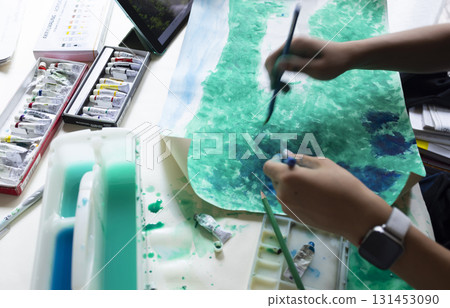 Children's hands painting with paints Children's hands painting with paints 131453090