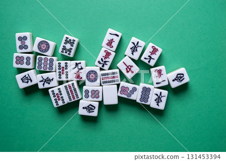 Mahjong tiles on a green background 131453394