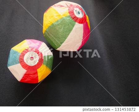 Paper balloon on black background 131453872