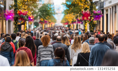 A crowded shopping street during Black Friday with people rushing to stores, colorful sale signs everywhere, and a festive holiday mood. Consumerism, sales, black friday. Online shopping. 131455258