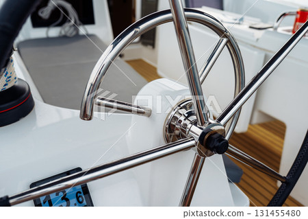 steering wheel on a yacht steering wheel on a yacht 131455480
