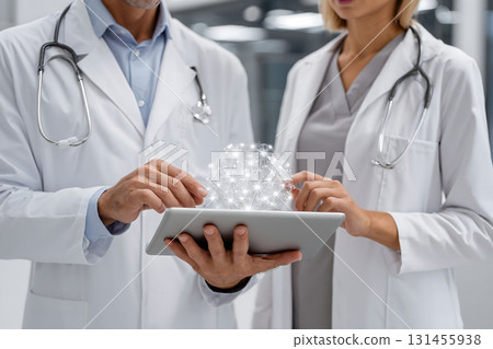 Doctors Using Digital Tablet with Futuristic Hologram Network 131455938