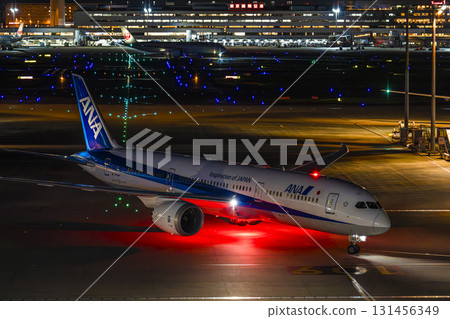 Haneda Airport at night, airplane taxiing, Ota Ward, Tokyo 131456349