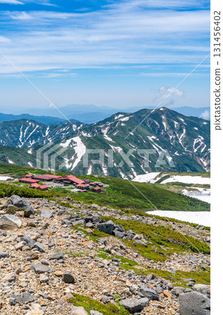 View of Mt. Betsuyama and Murodo Center from the snowy fields of Mt. Hakusan Gozenmine. Climbing Mt. Hakusan Gozenmine in early summer (Pond Tour Course) View of Mt. Betsuyama and Murodo Center from the snowy fields of Mt. Hakusan Gozenmine. Climbing Mt. Hakusan Gozenmine in early summer (Pond Tour Course) 131456402