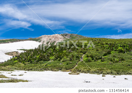 View of Mt. Hakusan Gozenmine from Midagahara Mountain. Climbing Mt. Hakusan Gozenmine in early summer. View of Mt. Hakusan Gozenmine from Midagahara Mountain. Climbing Mt. Hakusan Gozenmine in early summer. 131456414
