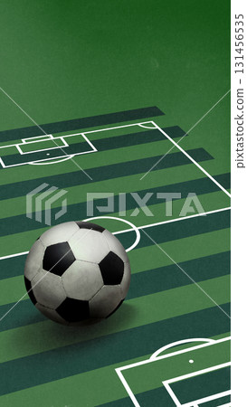 Bold colorful poster. Gigantic soccer ball on striped green football field 131456535