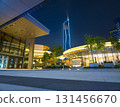 Urban plaza at night featuring modern illuminated architecture 131456670