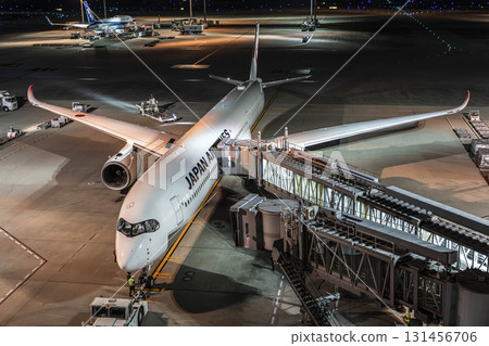 Haneda Airport at night, parked airplane, Ota Ward, Tokyo 131456706