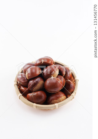 chestnuts in a colander 131456770