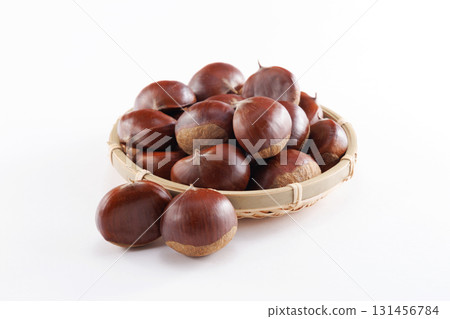 chestnuts in a colander chestnuts in a colander 131456784