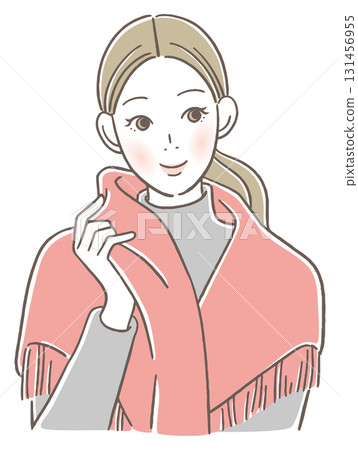A woman draping a scarf over her shoulders 131456955