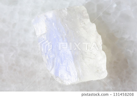 sample of raw adularia moonstone mineral on white sample of raw adularia moonstone mineral on white 131458208