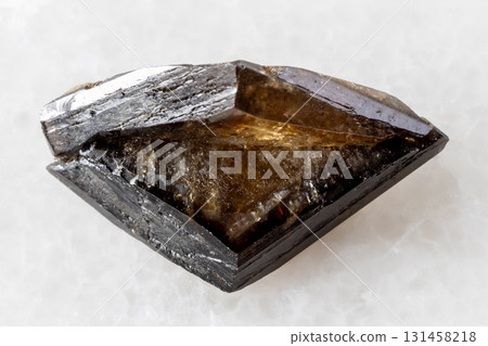 rough twinned brown titanite crystal on white rough twinned brown titanite crystal on white 131458218