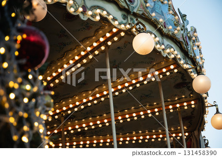 Xmas Illuminated Carousel at Festive Event Xmas Illuminated Carousel at Festive Event 131458390
