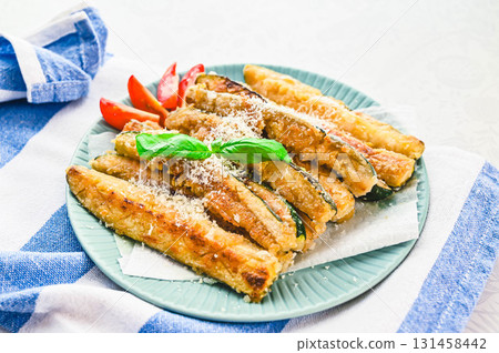 Deep fried zucchini with cheese Deep fried zucchini with cheese 131458442