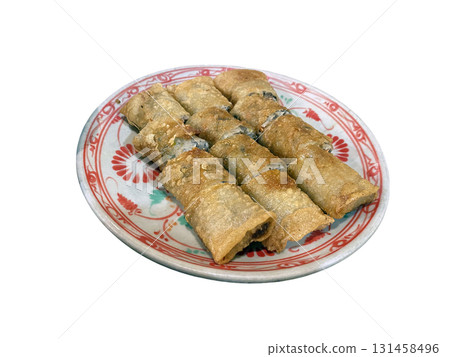 Crispy Vietnamese fried spring rolls served with dipping sauce on traditional plate 131458496