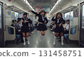A synchronized photo of three Asian women in sailor uniforms posing with the Yamanote Line in the background 131458751