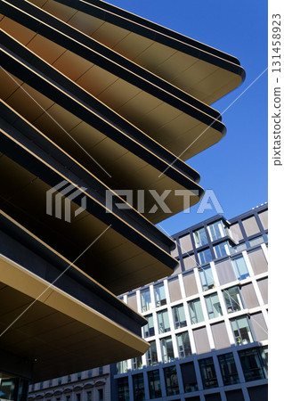 Masarycka office and retail building by Zaha Hadid Architects with golden facade on March 5, 2025 in Prague, Czech Republic. 131458923