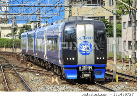 Blue Mu Sky running near Jingumae Station Blue Mu Sky running near Jingumae Station 131459727