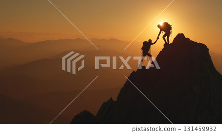 Silhouette of a man and woman helping each other climb the mountain 131459932