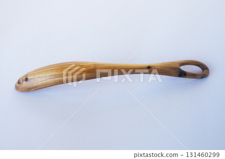 Wooden kitchen utensils stacked view close up isolated Wooden kitchen utensils stacked view close up isolated 131460299