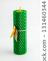 Natural wax candles with bay leaf and dried orange for rituals and space cleansing 131460344