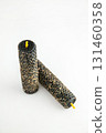 Unique decorative candles with a textured surface for home decor 131460358
