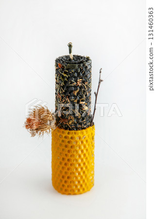 Bee-inspired beeswax ritual candle for wealth and protection with herbs and burdock 131460363