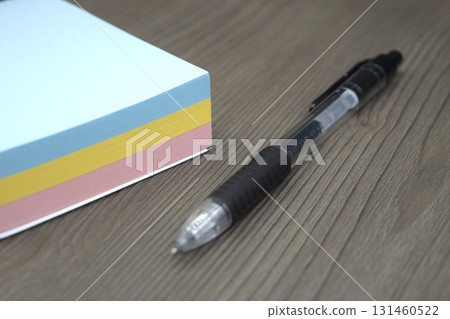 Notepad and ballpoint pen 131460522