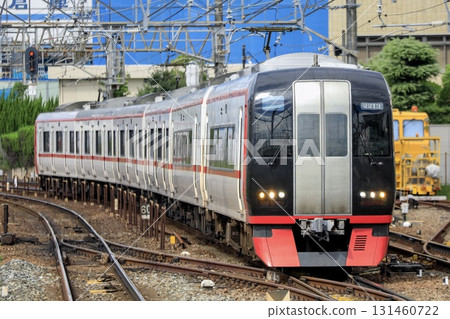 Meitetsu 2200 series Airport Express train running near Jingumae Station Meitetsu 2200 series Airport Express train running near Jingumae Station 131460722