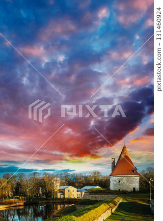 Kuressaare, Saaremaa, Estonia. Cannon Tower On Territory Of Episcopal Castle In Sunset. Traditional Medieval Architecture, Famous Attraction Landmark Kuressaare, Saaremaa, Estonia. Cannon Tower On Territory Of Episcopal Castle In Sunset. Traditional Medieval Architecture, Famous Attraction Landmark 131460924