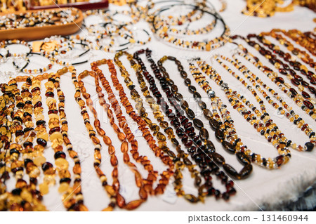 Amber Beads. Jewellery Made Of Amber. Traditional Souvenirs At European Market. Souvenir From Baltic Countries, Europe 131460944
