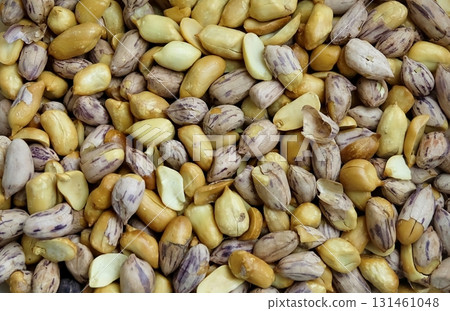 Vibrant Food Texture Background Pattern of Shelled Tiger Stripe Peanuts 131461048