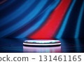 Futuristic glowing circular podium on a reflective surface with swirling patterns. Abstract blue and red striped background creates a vibrant, modern, and tech inspired product display stage. 131461165