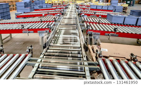 logistic warehouse. packing line in a logistics warehouse. conveyor belt in a modern production line 131461950