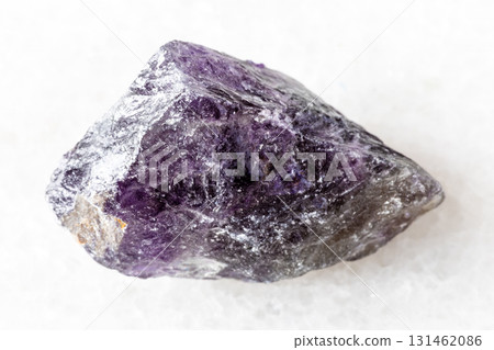 sample of raw amethyst mineral on white marble sample of raw amethyst mineral on white marble 131462086