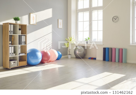 Sporty fitness room with gym equipment, medical, class to exercise, space for playing indoor sport 131462162