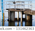 Spillway at a reservoir, a dam and its spillway at a reservoir. Observe the controlled release of water, Witness the raw power of controlled water, Demonstrates water 131462363