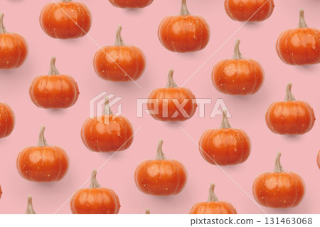 Orange pumpkin pattern on pastel color background Orange pumpkin pattern on pastel color background 131463068