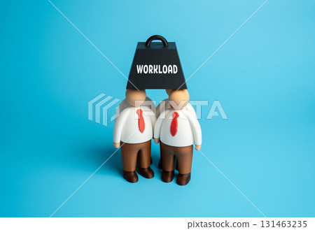 High workload for employees. Burnout and demoralization. Workplace stress, mental health, HR strategies, corporate culture, productivity loss, and business management challenges. 131463235