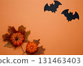 Halloween decoration pumpkins bats maple leaves autumn festive mood 131463403