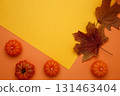 Halloween decoration pumpkins maple leaves autumn festive mood 131463404