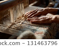 Crafting traditional fabric on modern loom close-up 131463796